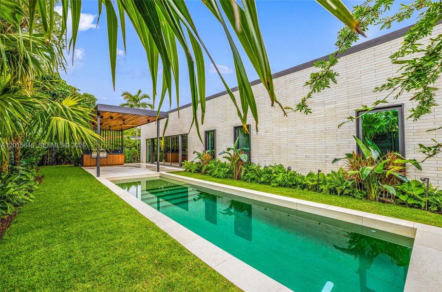 Exterior details and patio area of a home in , Miami (Image 30). Exterior details and patio area of a home in , Miami (Image 30).