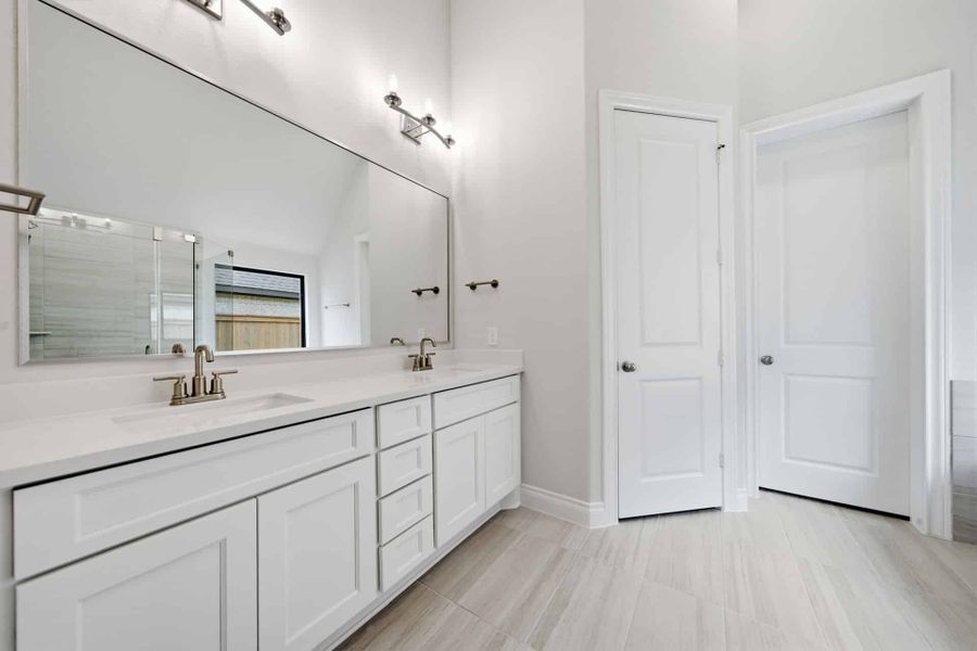 Furnished interior view inside a new home in Bridgeland 50′, Cypress (Image 8).