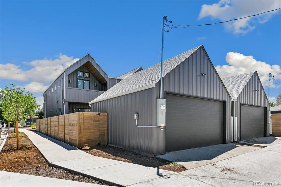 8 Foot Garage Doors for all your Gear! EV pre-wired!