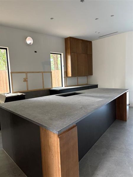 Another view of Kitchen. Will have solid backsplash honed light color product.nMany large drawers. Included a full Butlers pantry and hidden area for your items you don't want to see on a counter.