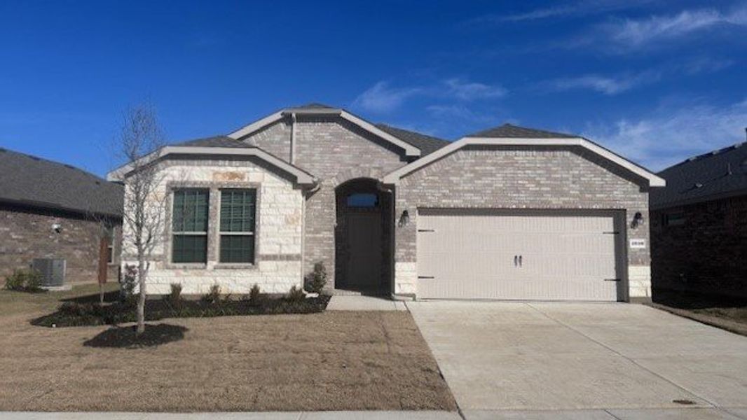 Representative exterior photo of a completed home built from the CROWNPOINT by D.R. Horton in Bluestem, Rhome, TX (Image 2). Representative exterior photo of a completed home built from the CROWNPOINT by D.R. Horton in Bluestem, Rhome, TX (Image 2).