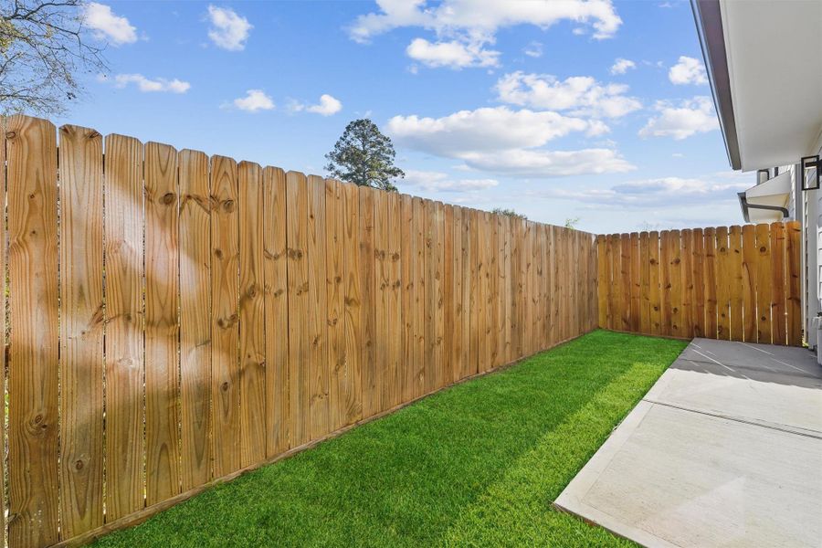 Exterior details and patio area of a home in , Houston (Image 3).