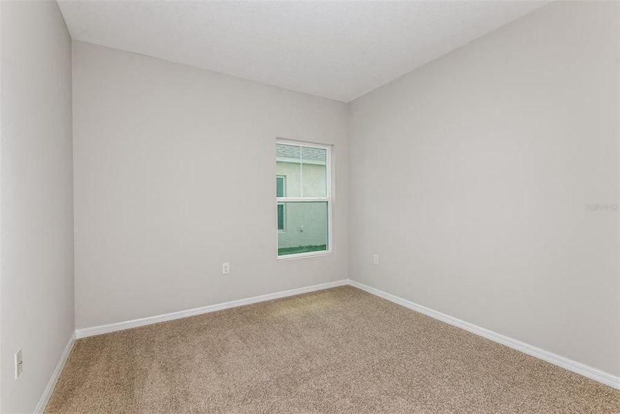 Spacious, unfurnished interior of a new home in Pasadena Ridge, Dade City (Image 16).