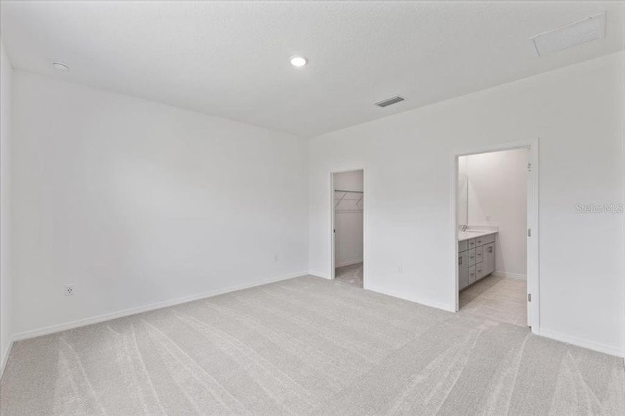 Spacious, unfurnished interior of a new home in Highfield at Twisted Oaks, Wildwood (Image 9).