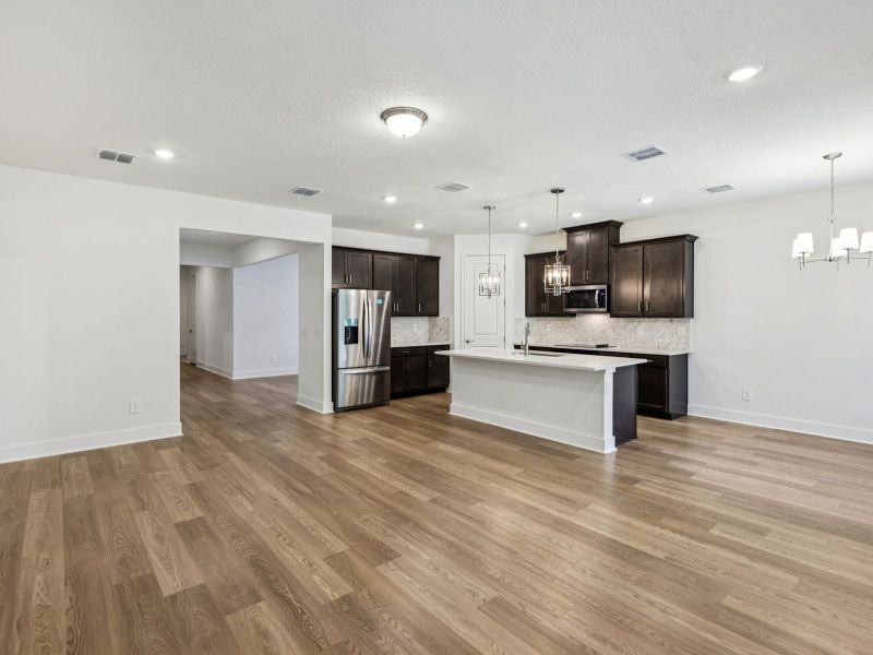 Furnished interior view inside a new home in Ridgehaven - Signature Series, Ormond Beach (Image 3).