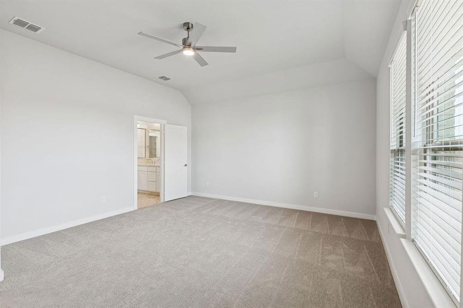 Primary Suite in the Stanley II home plan by Trophy Signature Homes – REPRESENTATIVE PHOTO