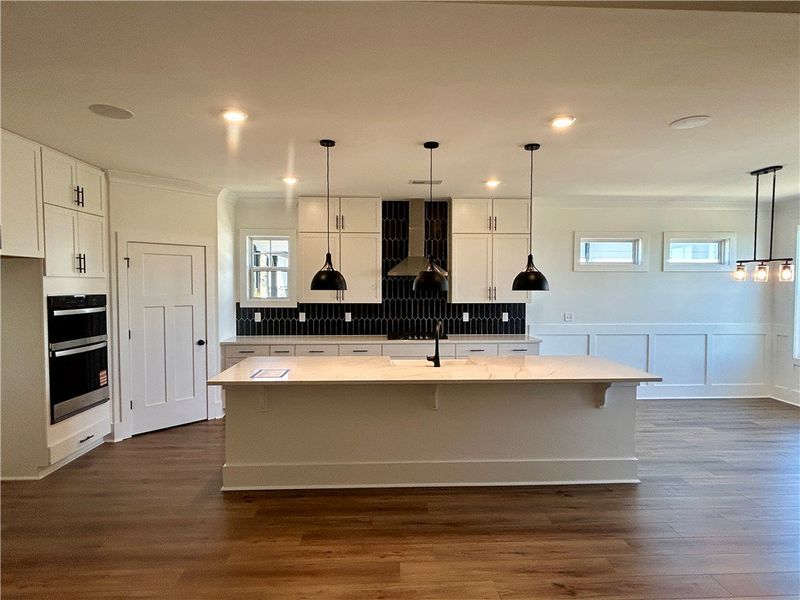 Furnished interior view inside a new home in Edwards Ridge, Central (Image 2).