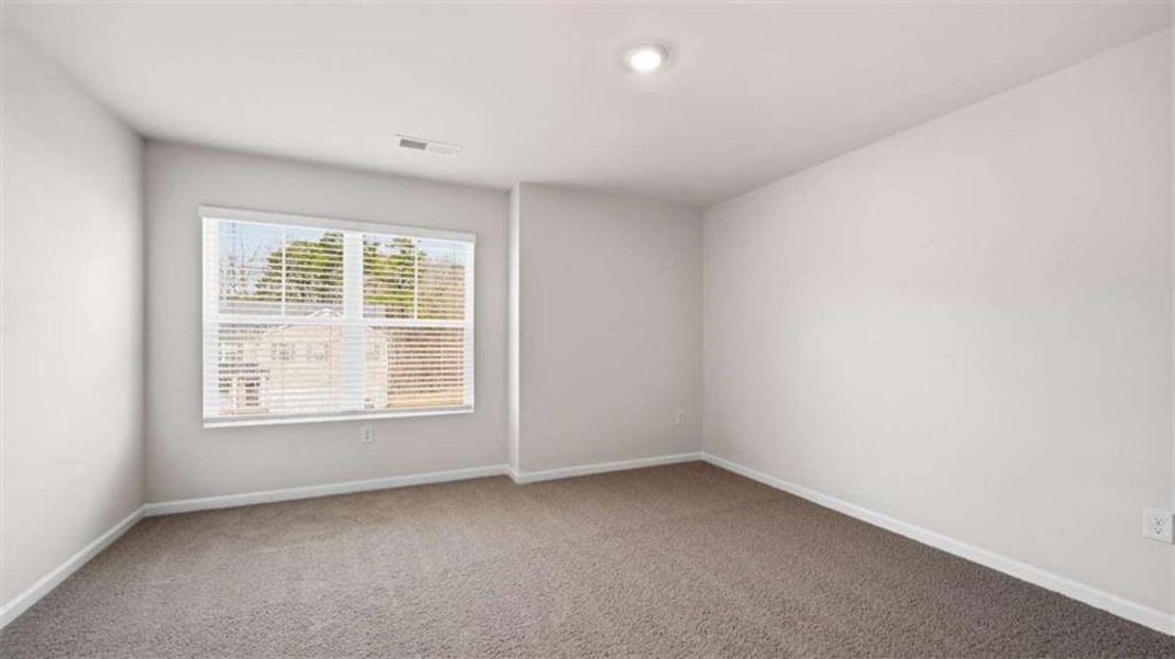 Spacious, unfurnished interior of a new home in Brooks Station, Dacula (Image 31).