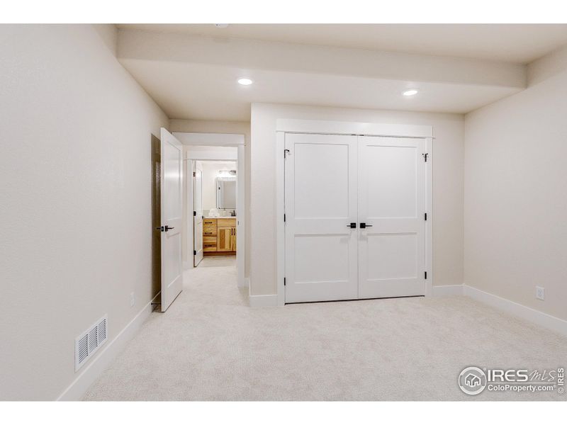 2nd basement bedroom with hall 3/4 bathroom