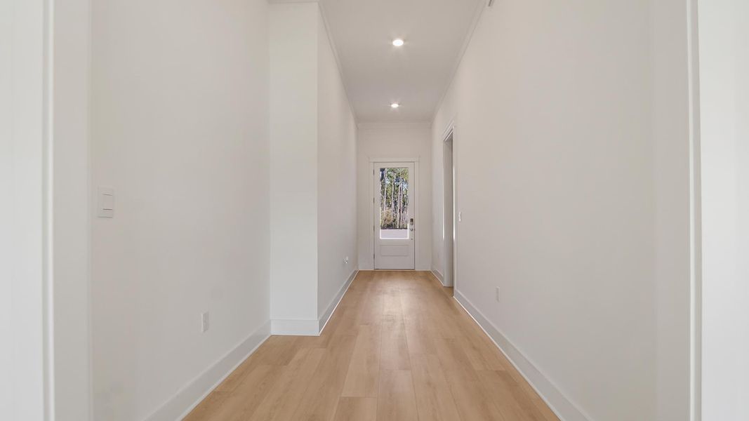 Representative unfurnished interior of a home built from the Camellia by D.R. Horton in Breakfast Point East Phase II, Panama City Beach (Image 21).
