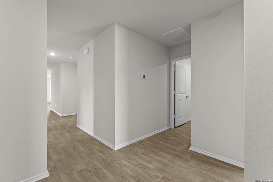 Spacious, unfurnished interior of a new home in Navarro Fields, Seguin (Image 27).