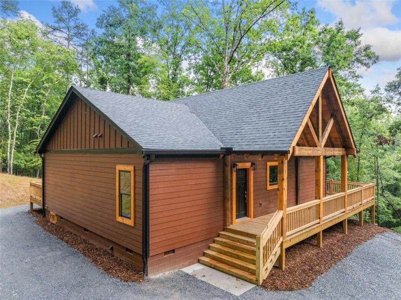 Front exterior of a new home in , Ellijay, GA, highlighting curb appeal (Image 1). Front exterior of a new home in , Ellijay, GA, highlighting curb appeal (Image 1).