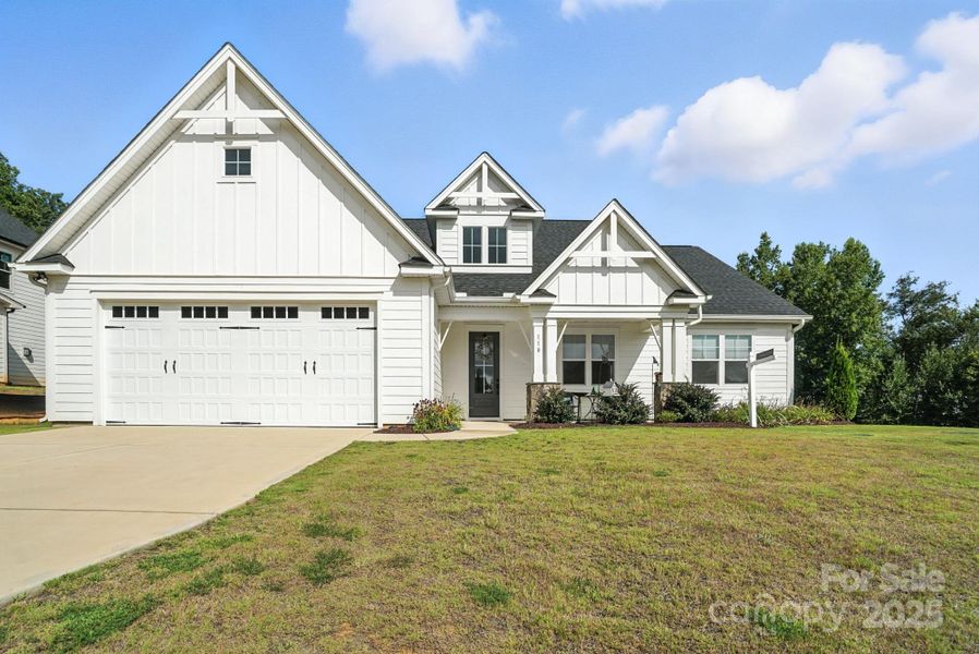 Front exterior of a new home in , Mooresville, NC, highlighting curb appeal (Image 23). Front exterior of a new home in , Mooresville, NC, highlighting curb appeal (Image 23).