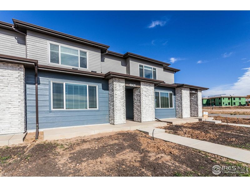 Exterior details and patio area of a home in , Timnath (Image 25).