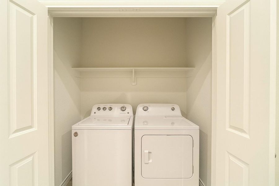 Furnished interior view inside a new home in Spring Branch Crossing, Conroe (Image 4).