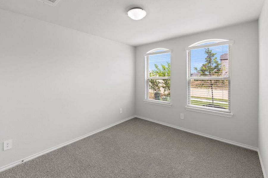 Representative exterior photo of a completed home built from the Boston by Impression Homes in Keeneland, Aubrey, TX (Image 21).