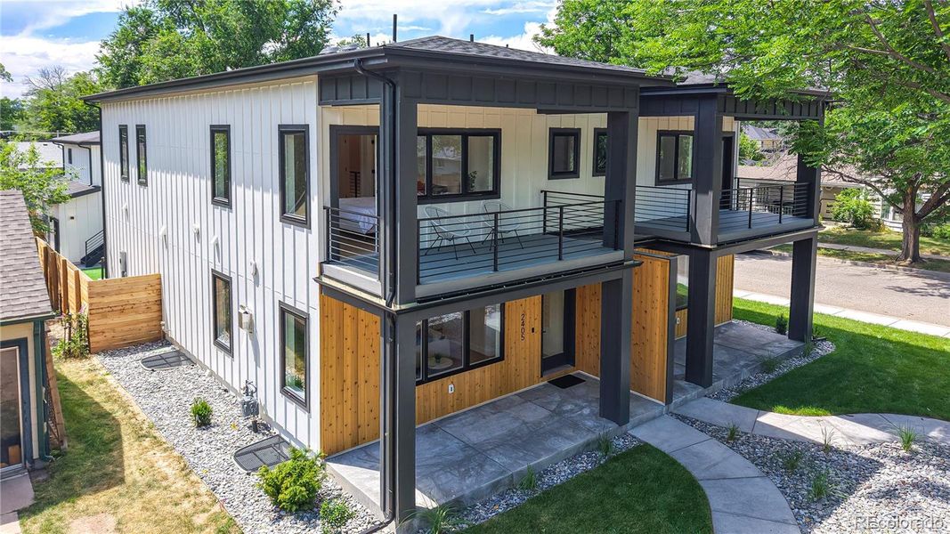 Front exterior of a new home in , Denver, CO, highlighting curb appeal (Image 1).