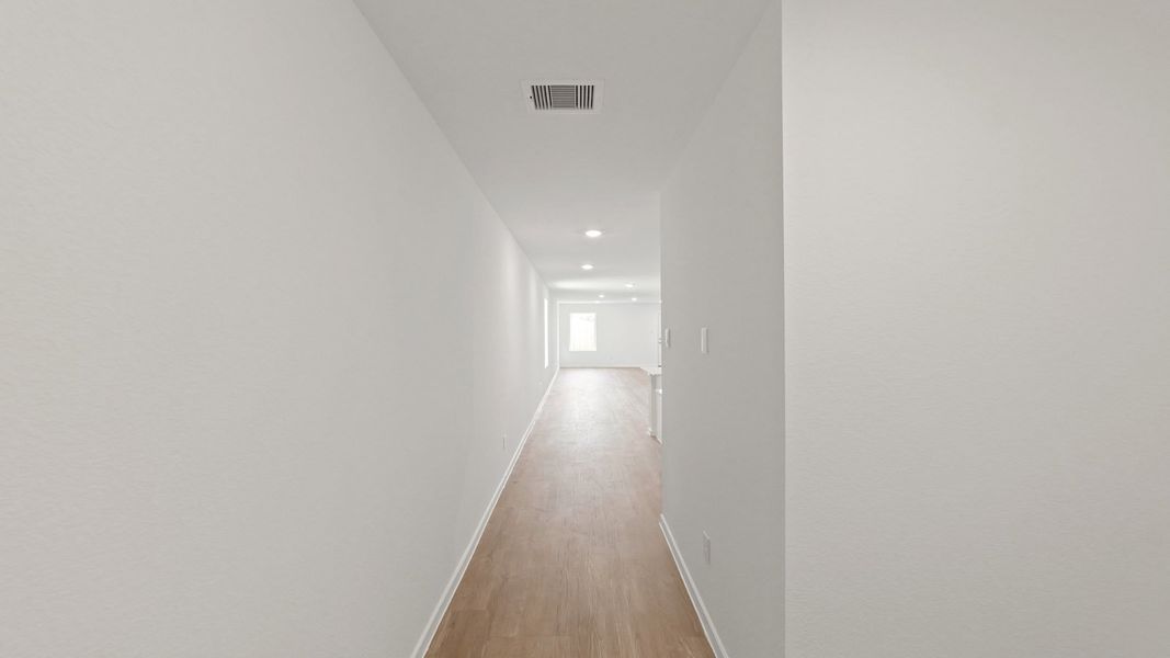 Representative unfurnished interior of a home built from the Estero by D.R. Horton in Lake Conroe Cove, Willis (Image 18). Representative unfurnished interior of a home built from the Estero by D.R. Horton in Lake Conroe Cove, Willis (Image 18).