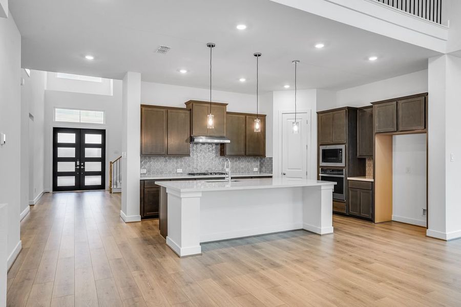 Furnished interior view inside a new home in Avalon at Cypress, Cypress (Image 6).