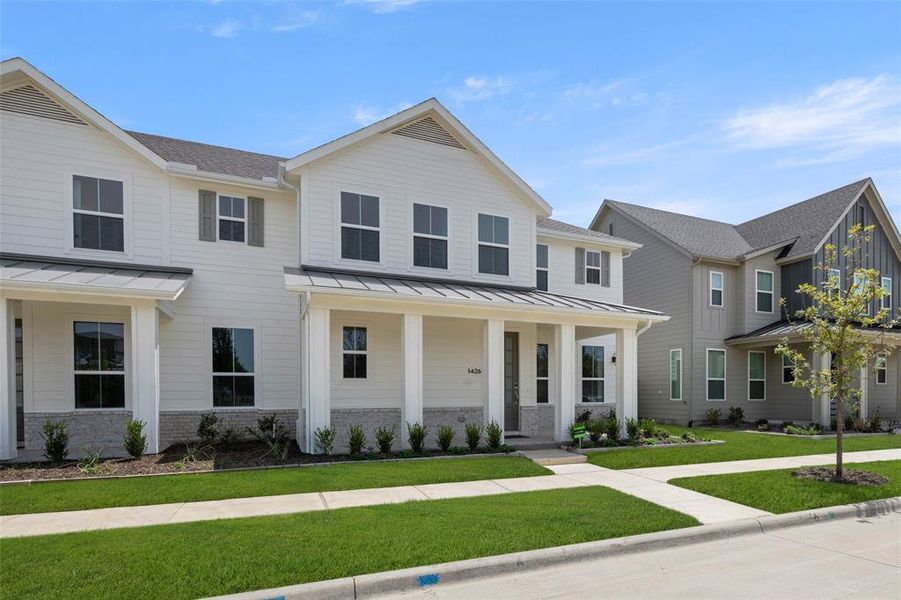 Front exterior of a new home in Terrace Collection at Harvest, Argyle, TX, highlighting curb appeal (Image 25). Front exterior of a new home in Terrace Collection at Harvest, Argyle, TX, highlighting curb appeal (Image 25).
