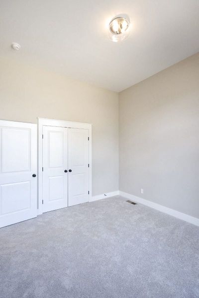 Spacious, unfurnished interior of a new home in Baker Road, Birchwood (Image 70).