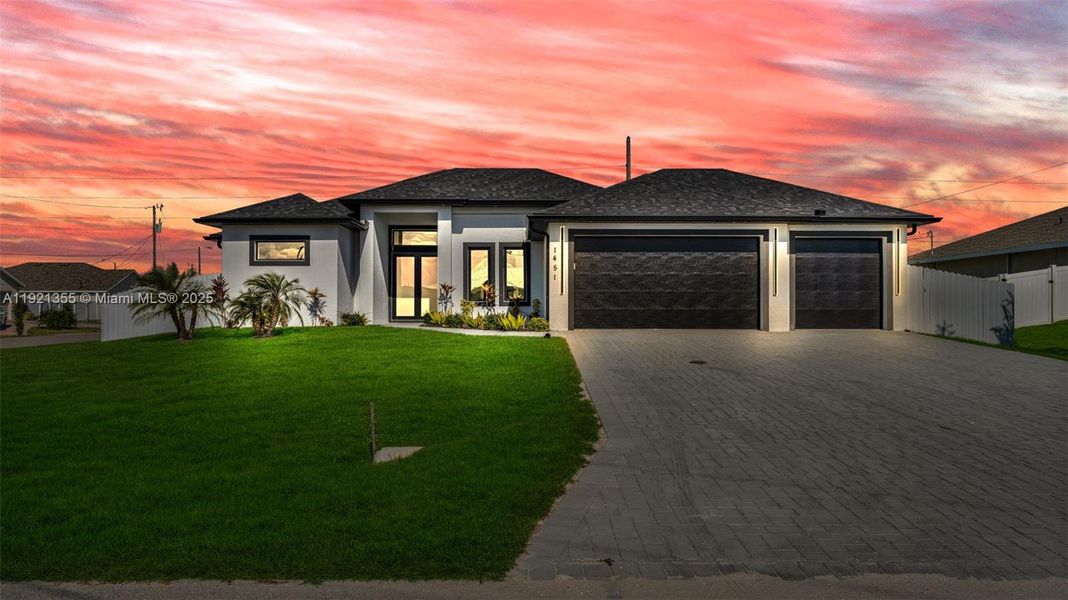 Front exterior of a new home in , Cape Coral, FL, highlighting curb appeal (Image 2).