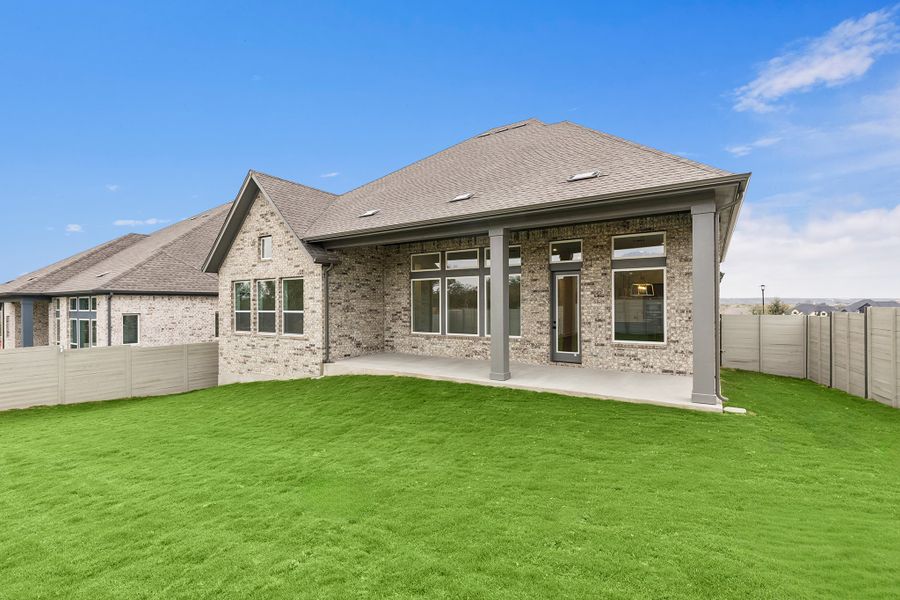 Exterior details and patio area of a home in Wolf Ranch – West Bend, Georgetown (Image 3).