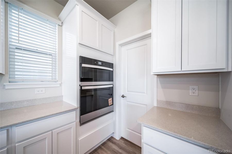 Furnished interior view inside a new home in Floret Collection at Alder Creek, Parker (Image 13).