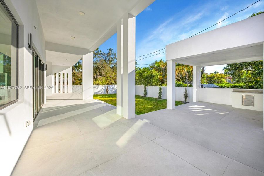 Exterior details and patio area of a home in , Miami Springs (Image 27).