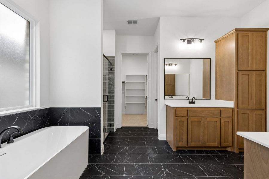 Representative furnished interior of a home built from the Pecos by Sandlin Homes in Settler's Glen, New Fairview (Image 9).