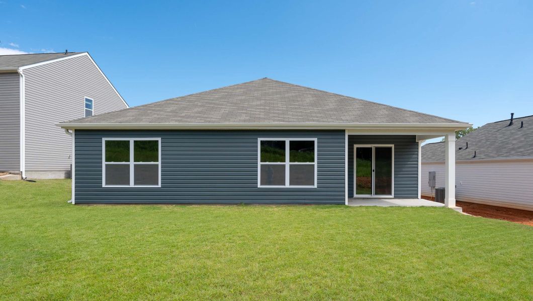 Exterior details and patio area of a home in Treemont Commons, Wellford (Image 3).