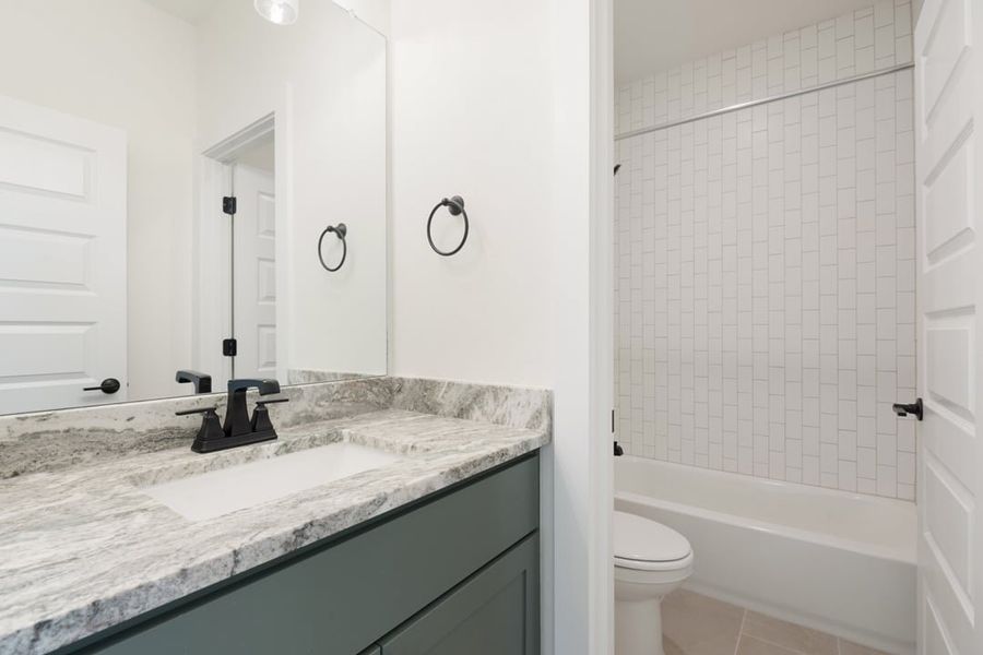 Furnished interior view inside a new home in Terrace Collection at Heritage, Dripping Springs (Image 15).