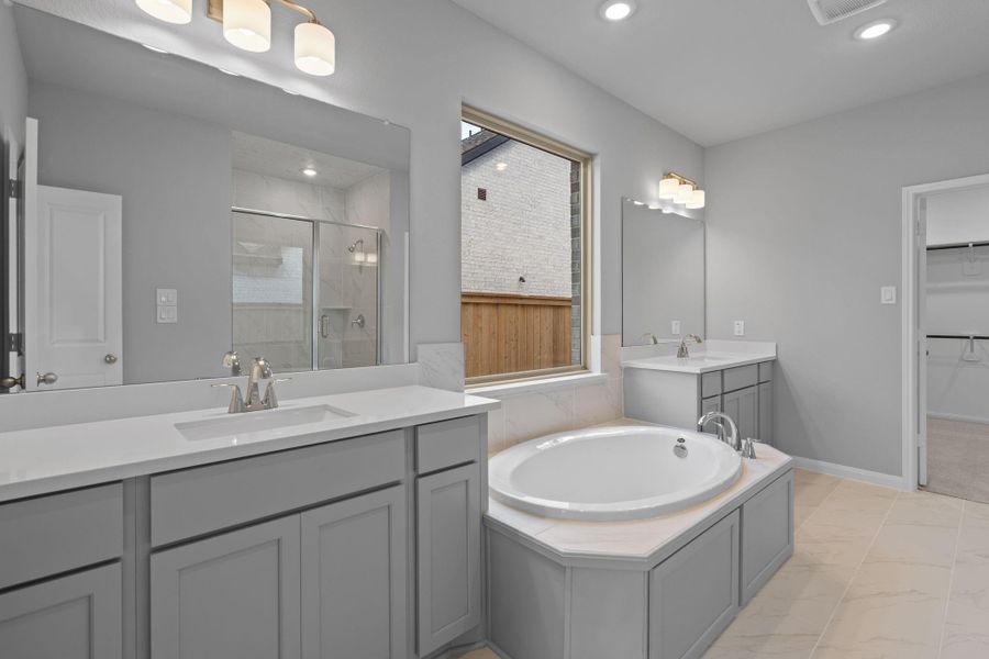 Furnished interior view inside a new home in Bridgeland 55', Cypress (Image 9).