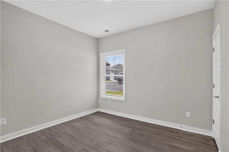 Spacious, unfurnished interior of a new home in The Cottages at East Lanier, Fayetteville (Image 12).