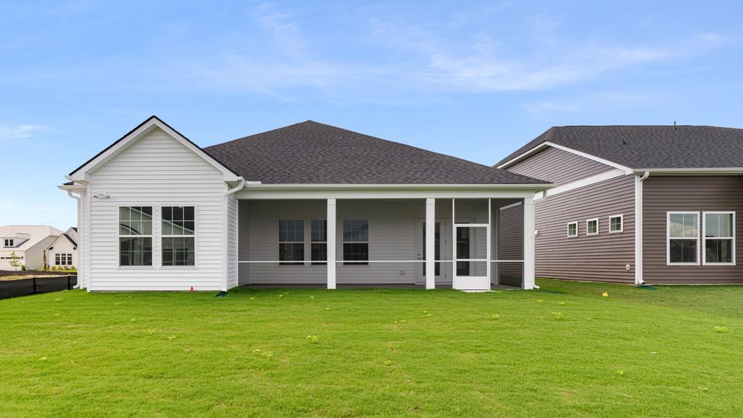 Representative exterior photo of a completed home built from the The Enthusiast by DRB Elevate. in Summerwind Crossing at Lakes of Cane Bay, Summerville, SC (Image 17). Representative exterior photo of a completed home built from the The Enthusiast by DRB Elevate. in Summerwind Crossing at Lakes of Cane Bay, Summerville, SC (Image 17).