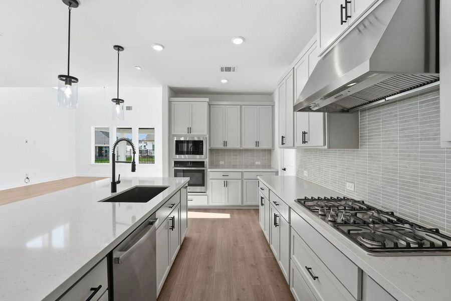 Furnished interior view inside a new home in Travisso, Leander (Image 7).