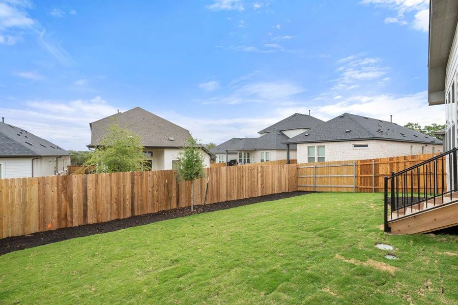 Exterior details and patio area of a home in Heritage, Dripping Springs (Image 22).