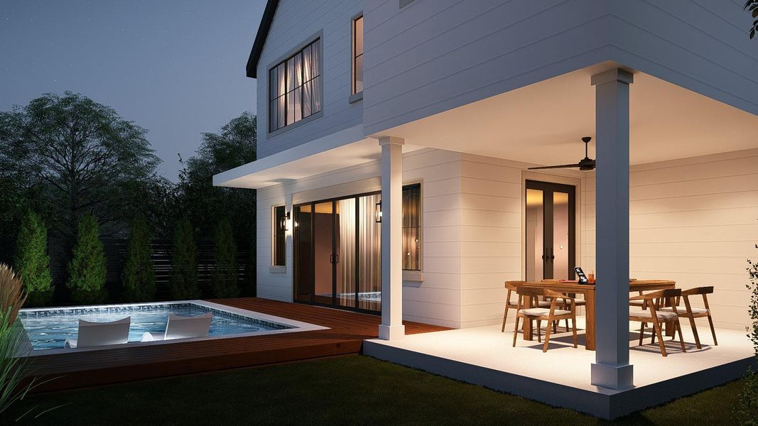 An inviting pool and covered patio extend outdoor living at this charming residence. An inviting pool and covered patio extend outdoor living at this charming residence.