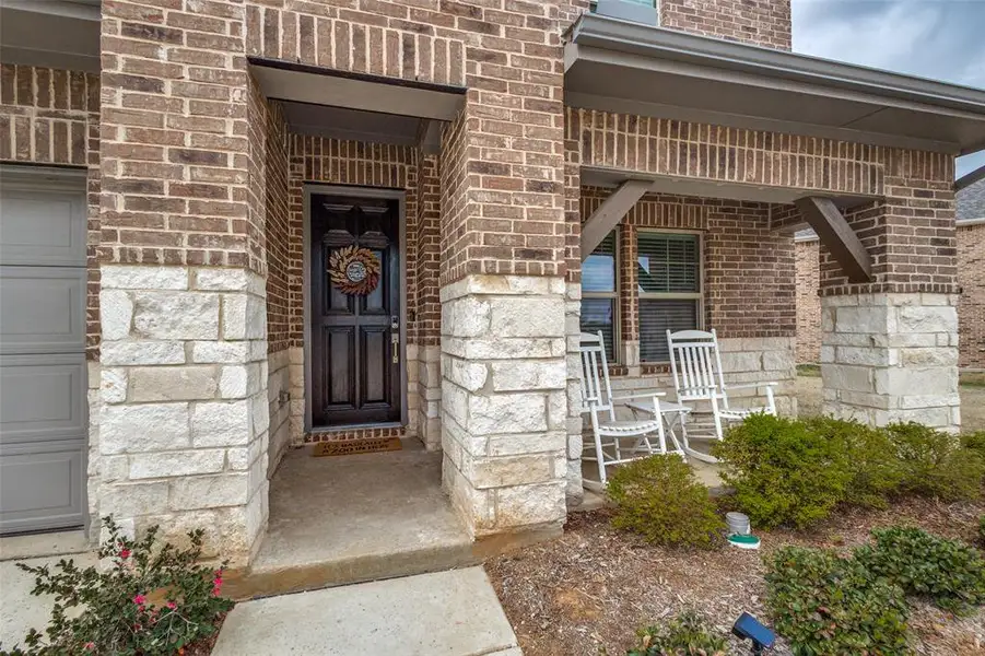 Exterior details and patio area of a home in Ashford Park - Texana Series, Corinth (Image 3).