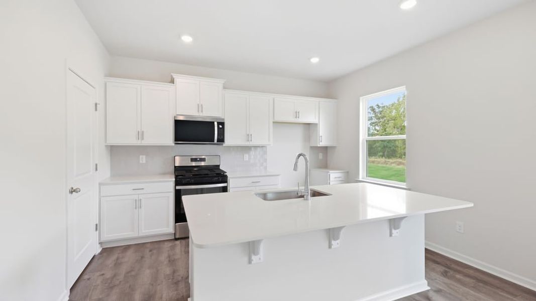 Furnished interior view inside a new home in Durbin Meadows Traditions, Fountain Inn (Image 9).