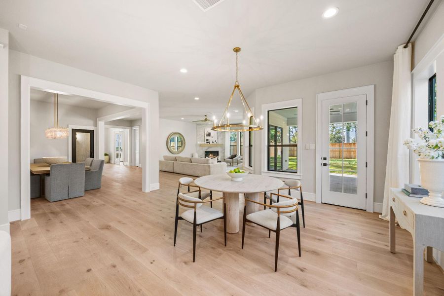 A view from the Kitchen, facing the Breakfast area & Family Room