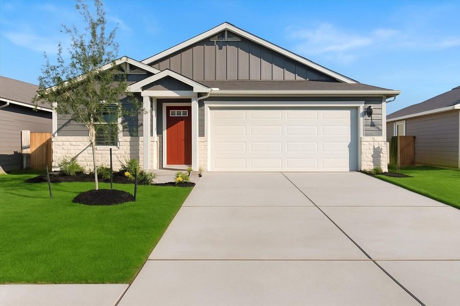 Front exterior of a new home in Waterstone Crossing, Kyle, TX, highlighting curb appeal (Image 1). Front exterior of a new home in Waterstone Crossing, Kyle, TX, highlighting curb appeal (Image 1).