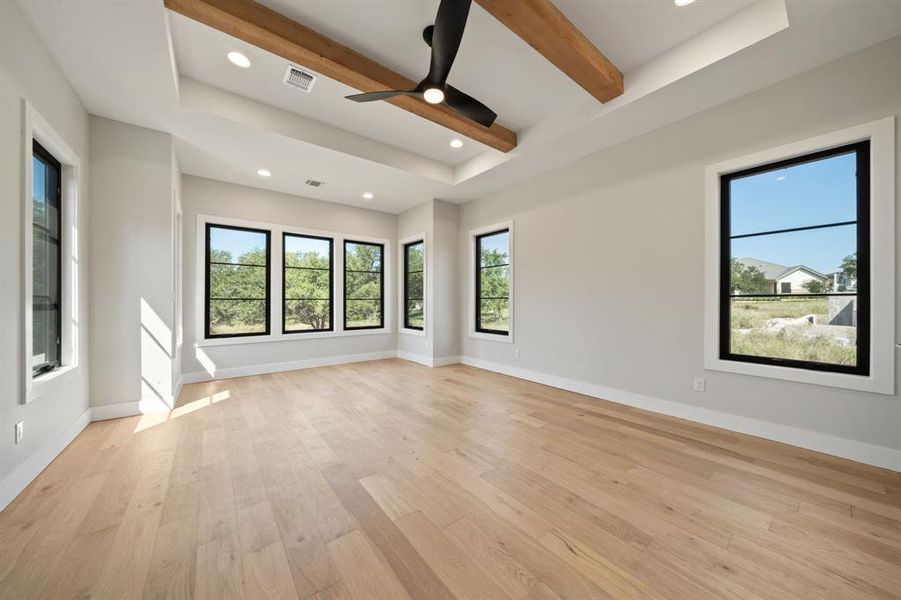 Main bedroom with a view of the backyard.