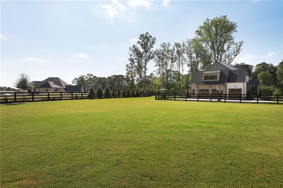 Front exterior of a new home in , Milton, GA, highlighting curb appeal (Image 34).