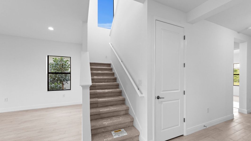 Spacious, unfurnished interior of a new home in SkySail, Naples (Image 27).