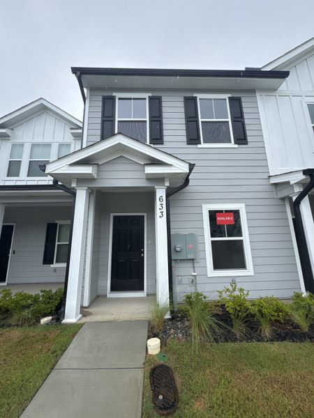 Front exterior of a new home in Forrest Bluff, North Augusta, SC, highlighting curb appeal (Image 19). Front exterior of a new home in Forrest Bluff, North Augusta, SC, highlighting curb appeal (Image 19).