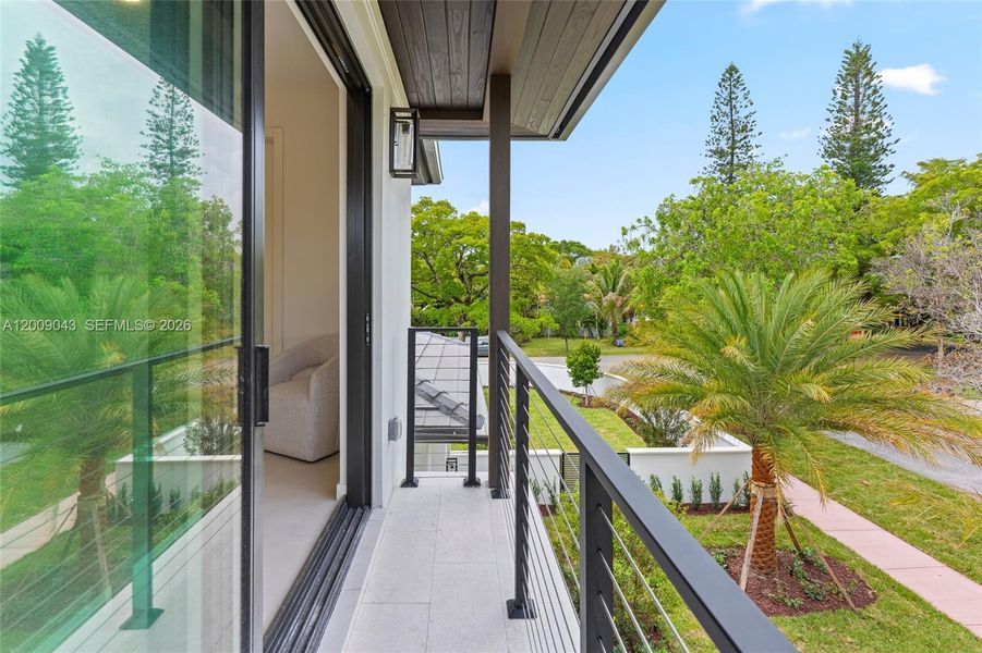Exterior details and patio area of a home in , Coral Gables (Image 24).