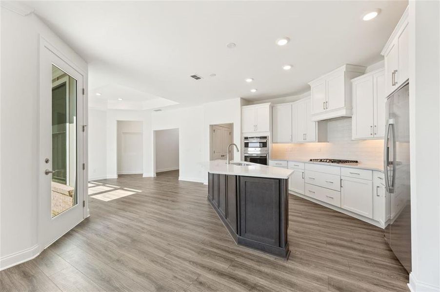Furnished interior view inside a new home in The Courtyards of Franklin Goldmine, Cumming (Image 5).