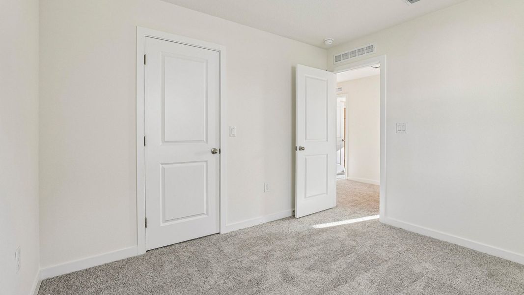 Furnished interior view inside a new home in Cyrene at Harmony, St. Cloud (Image 15).