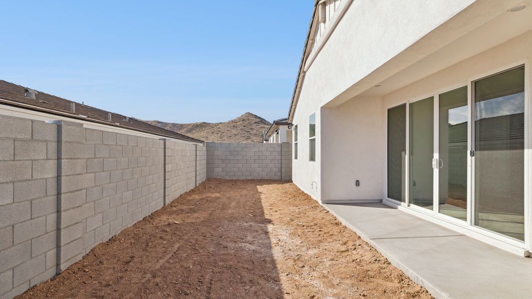 Exterior details and patio area of a home in The Ridge at Stone Butte, Phoenix (Image 2). Exterior details and patio area of a home in The Ridge at Stone Butte, Phoenix (Image 2).